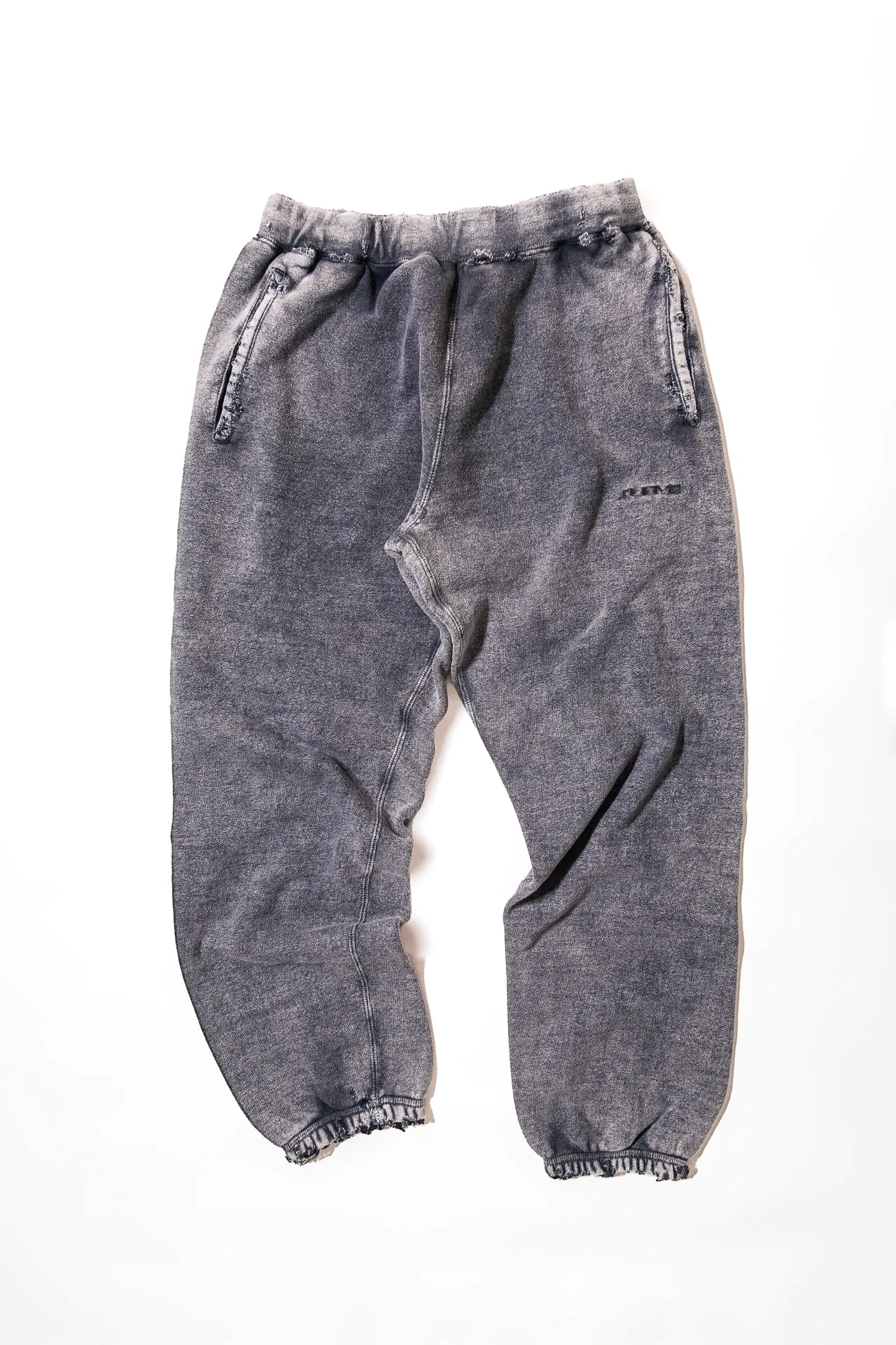 児島のデニム加工シェイヴのスウェットパンツ